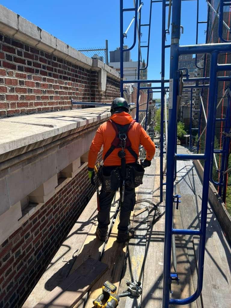 Building façade with scaffolding system installed